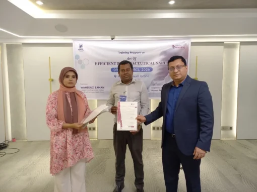 Trainer presenting certificate to participant at pharmaceutical sales training program Dhaka