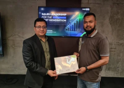 Wahiduz Zaman presenting certificate to participant in leadership training