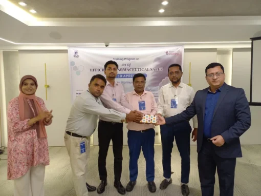 Participant receiving appreciation gift during pharmaceutical sales training program SMC Bangladesh
